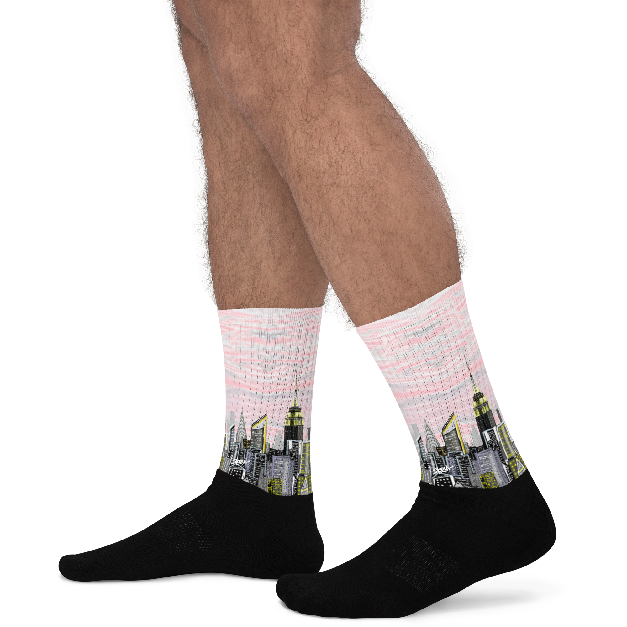 Person wearing socks with Loria NYC Art cityscape design on a white background