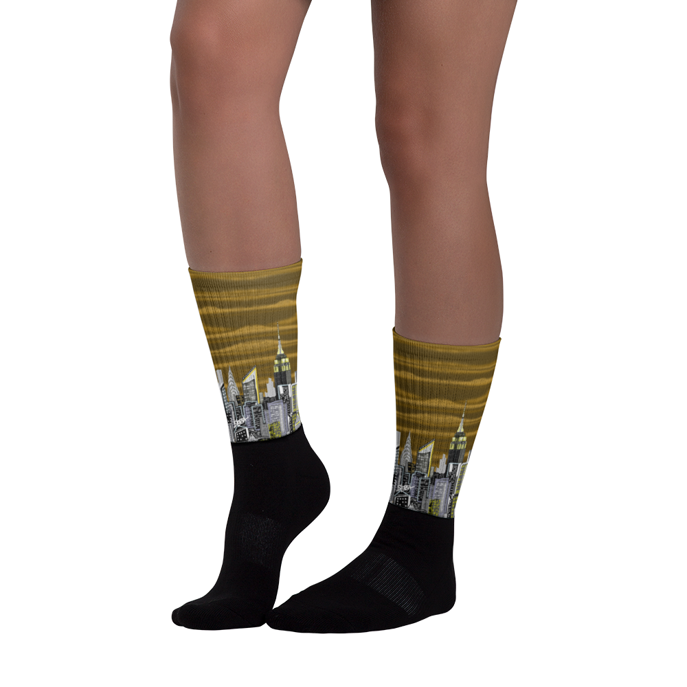 Black socks with a cityscape Loria NYC Art design on a white background