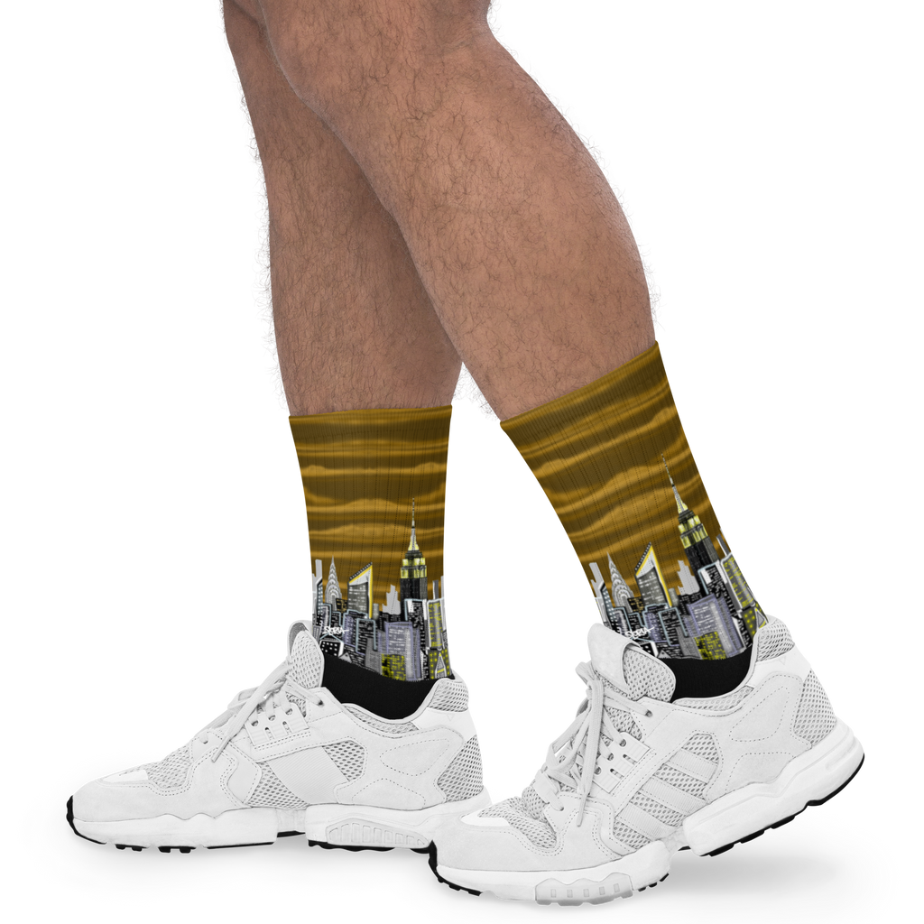 Person wearing socks with cityscape Loria NYC Art design and white sneakers on a white background