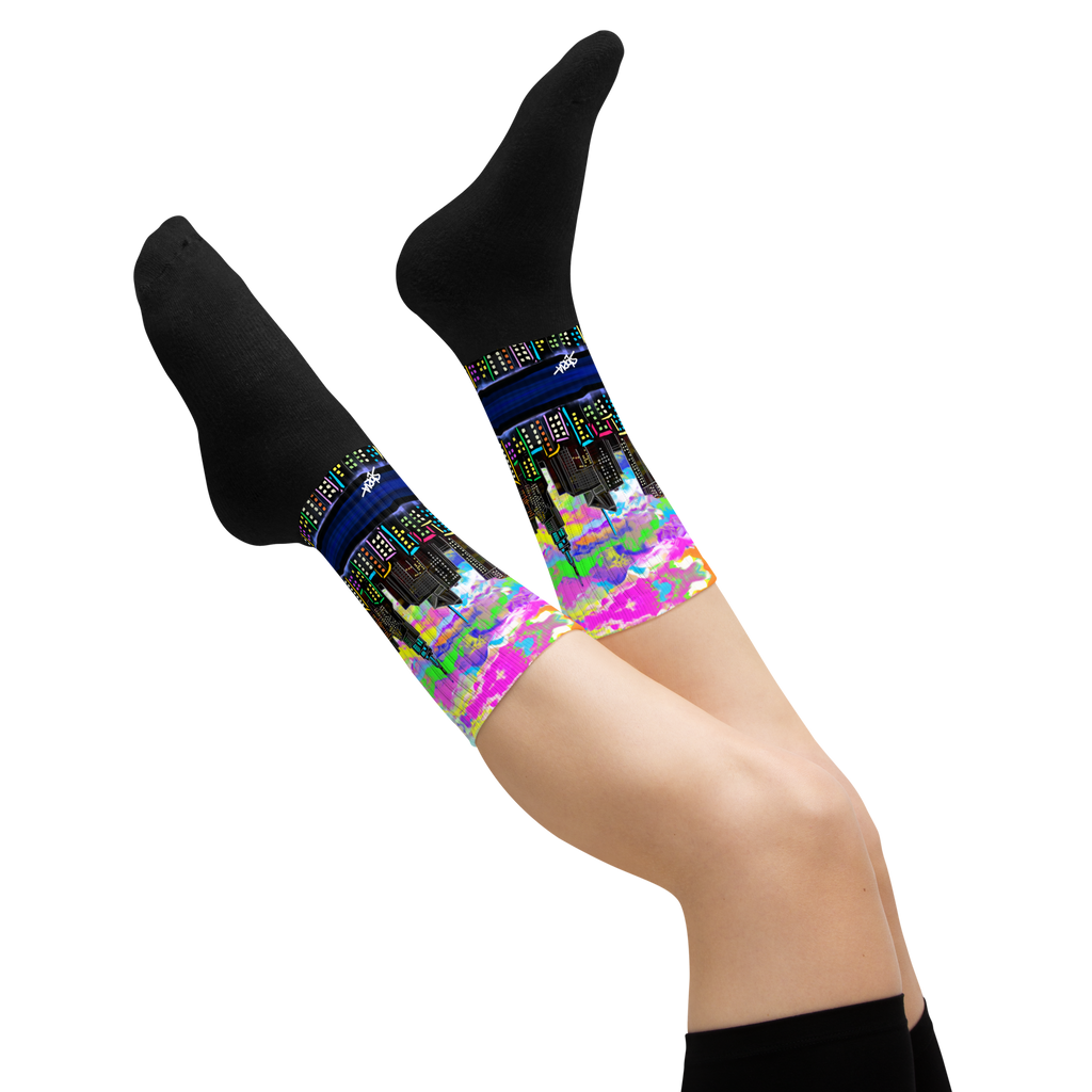 Colorful patterned Loria NYC Art socks on a white background