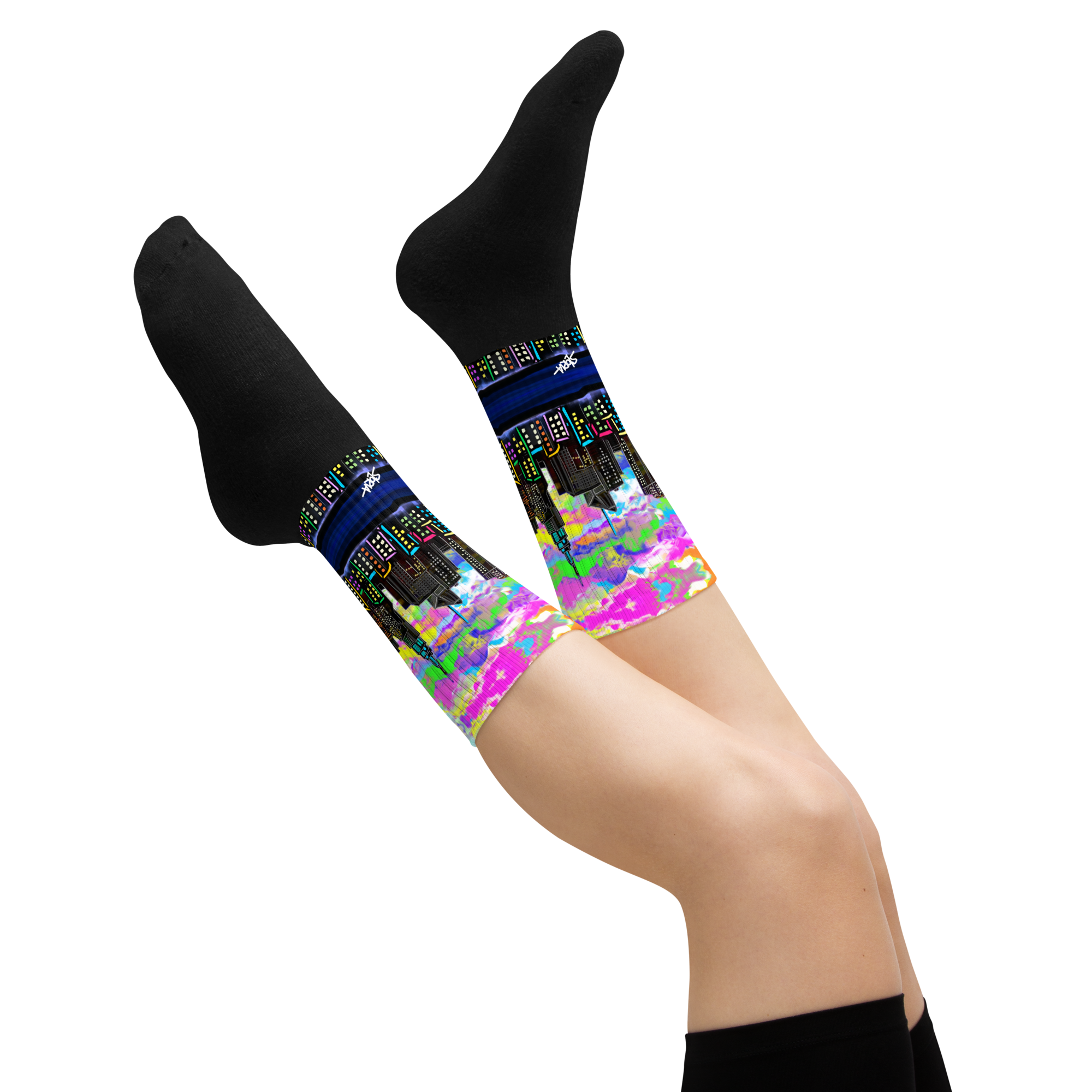 Colorful patterned Loria NYC Art socks on a white background