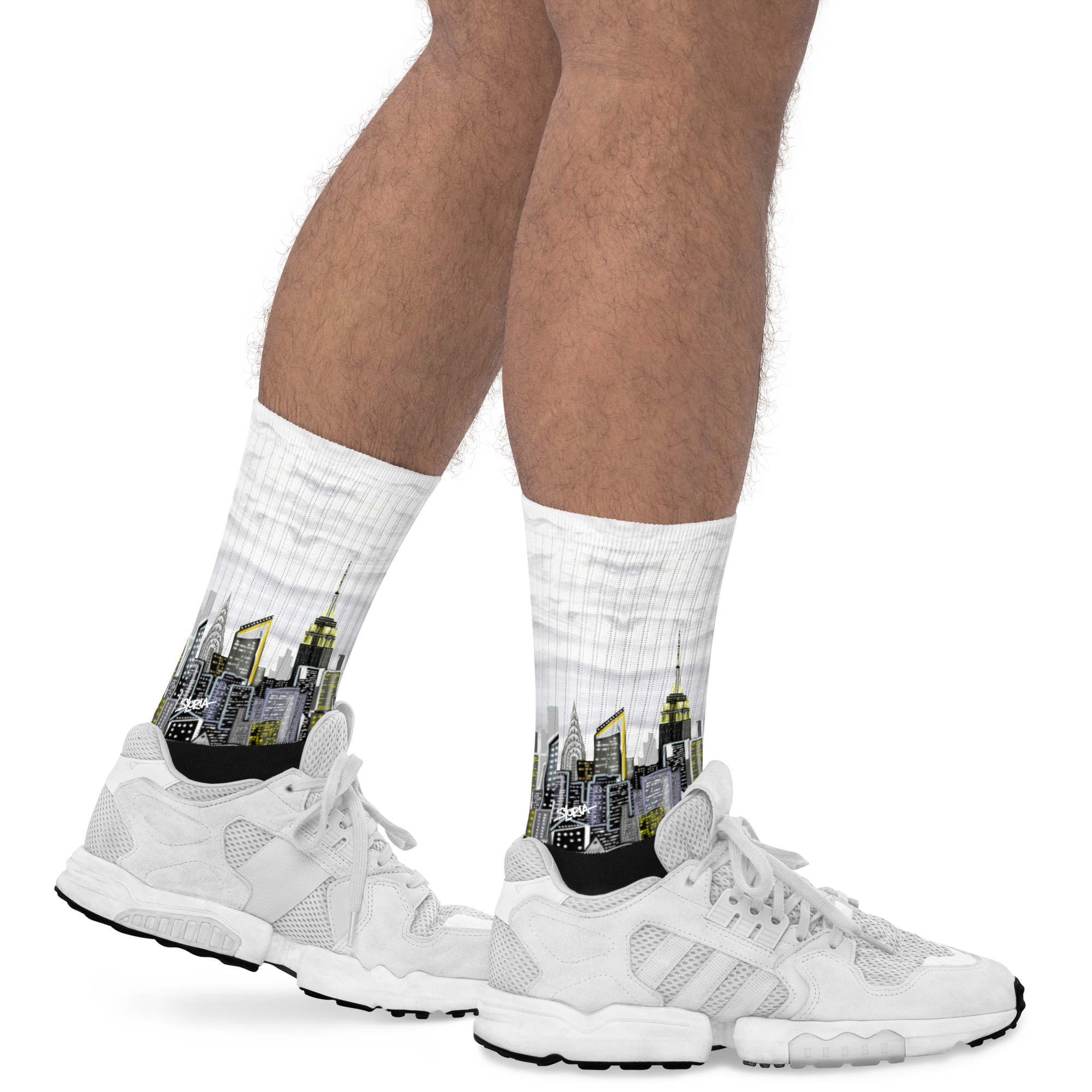 White socks with cityscape Loria NYC Art design worn with white sneakers on a white background