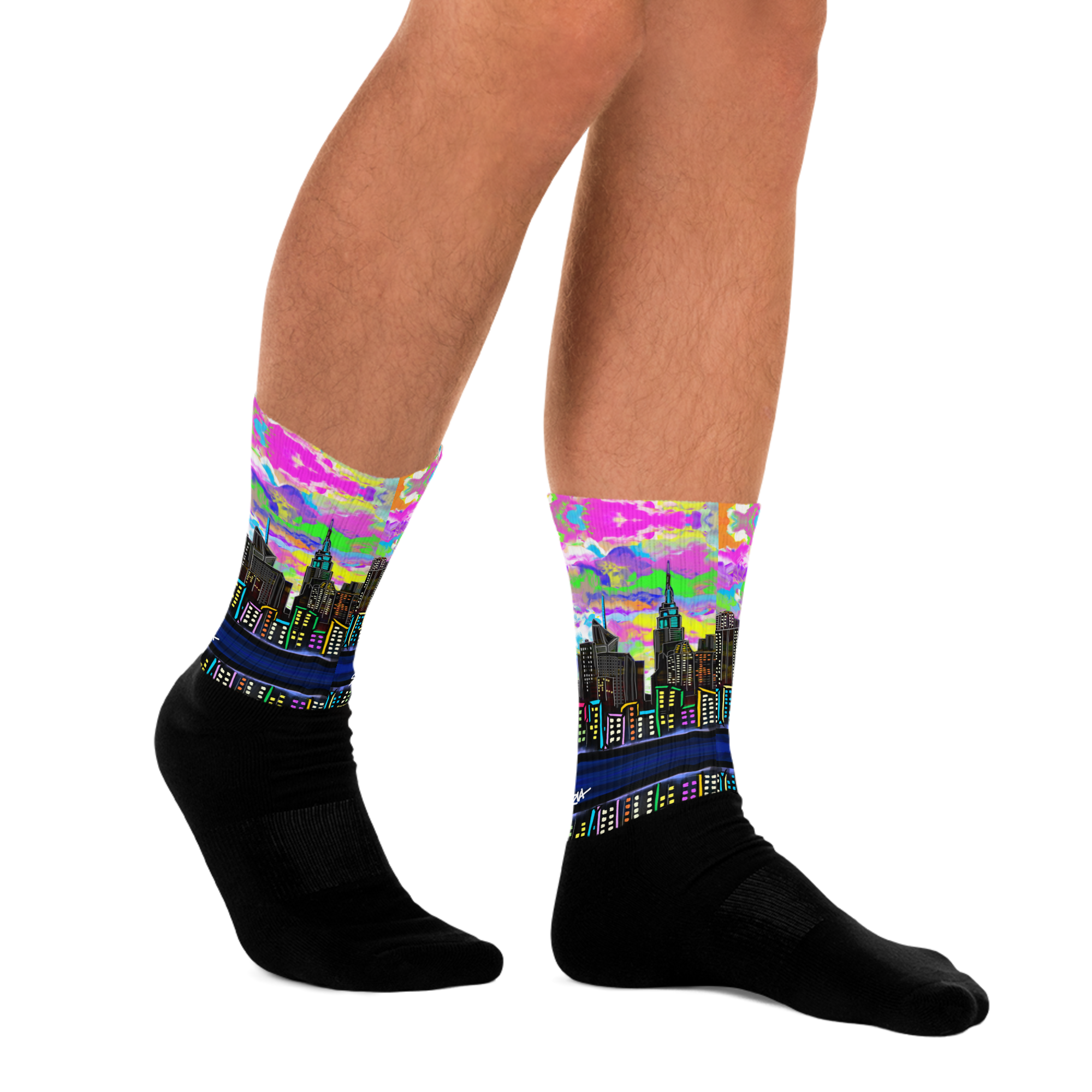 Colorful cityscape Loria NYC Art socks worn by a person on a white background