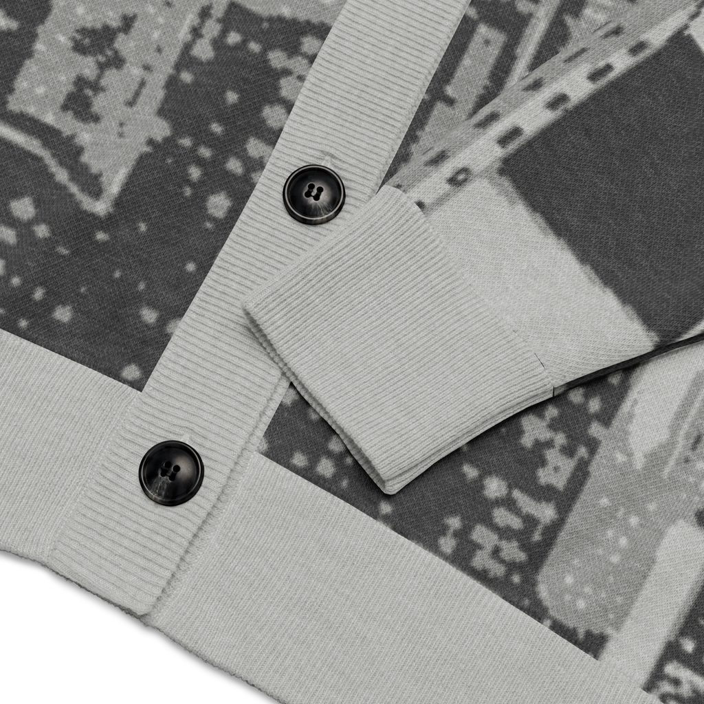 Close-up of a gray fabric with Loria NYC Art design on a patterned background