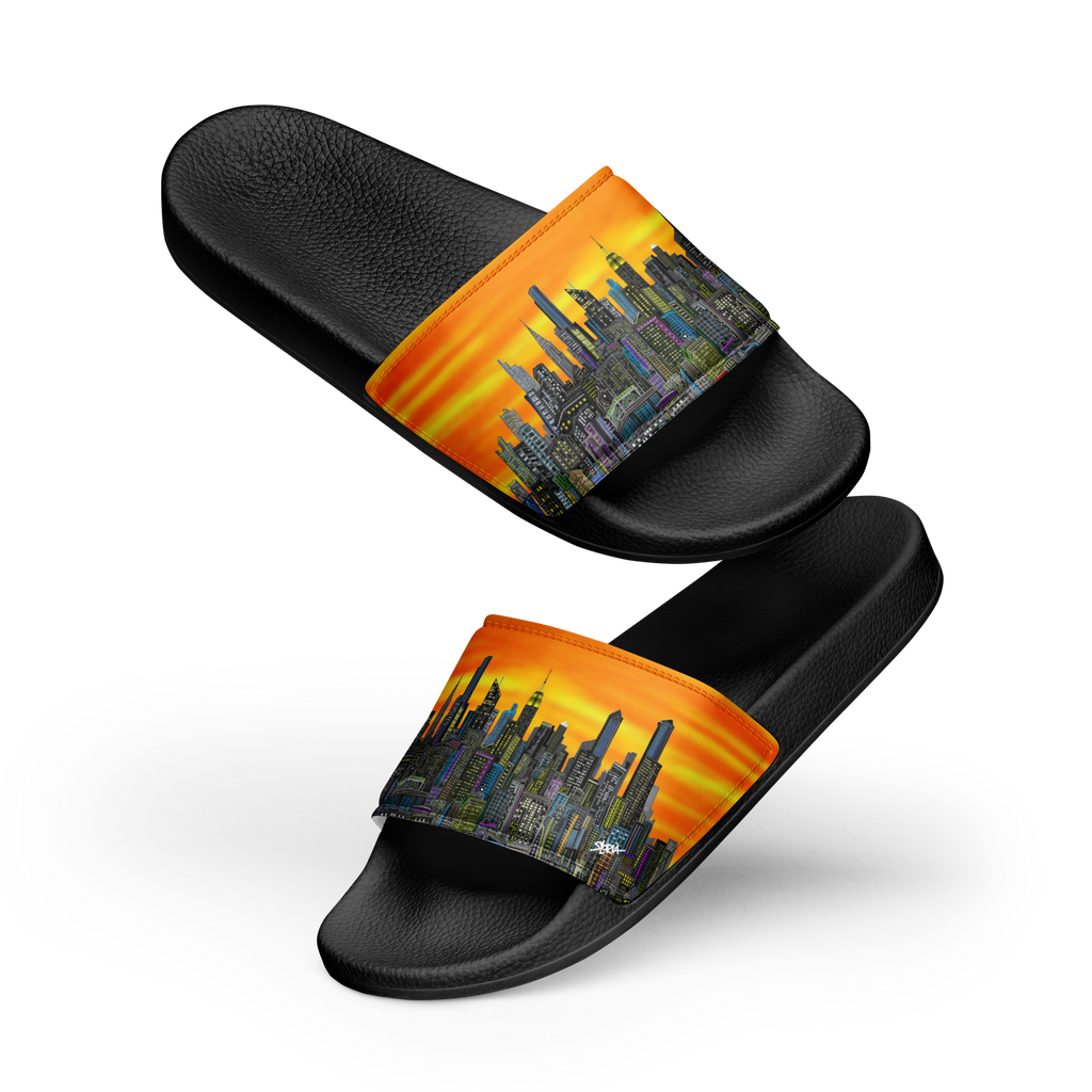 Black slide sandals with a Loria NYC Art colorful cityscape strap on a white background