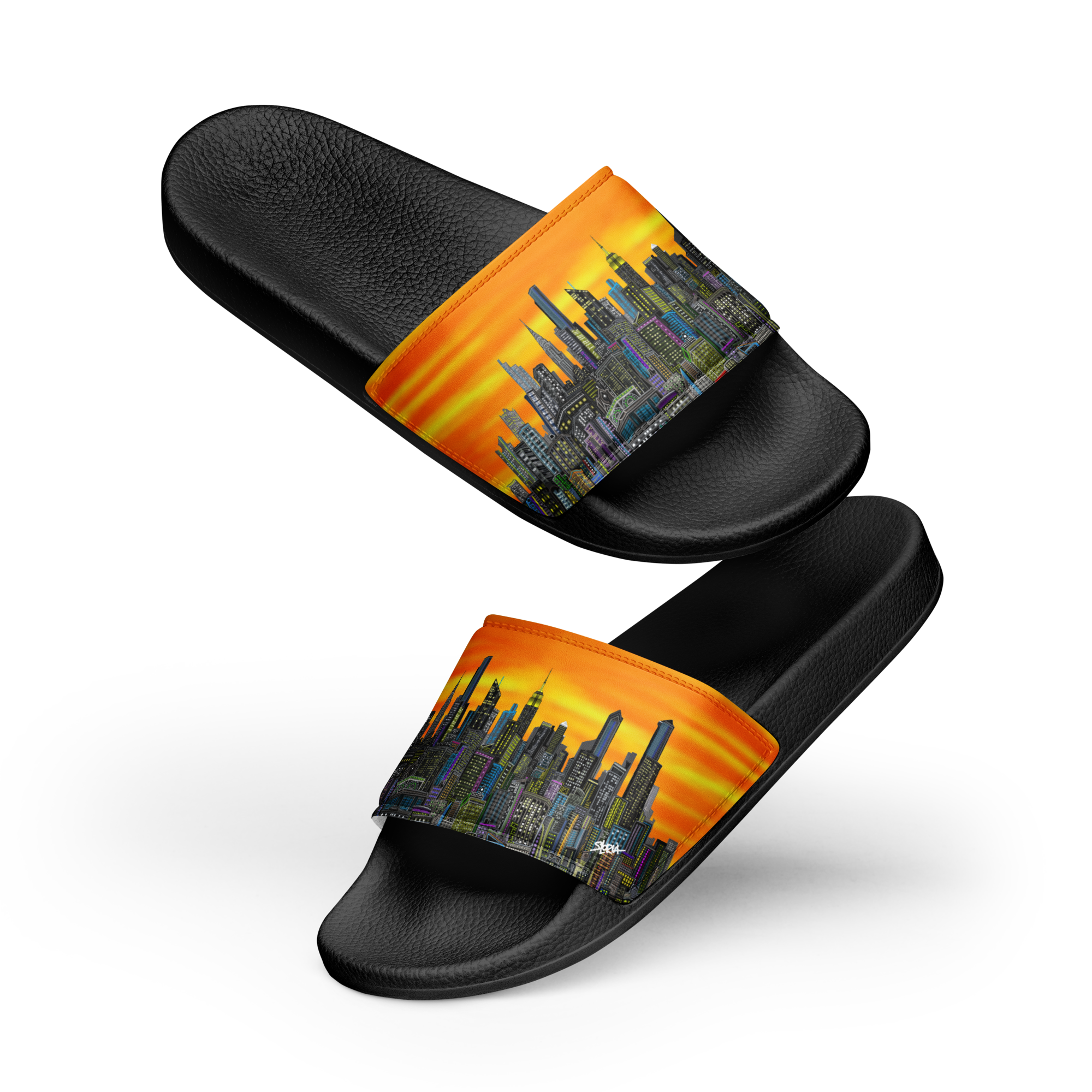 Black slide sandals with a Loria NYC Art colorful cityscape strap on a white background