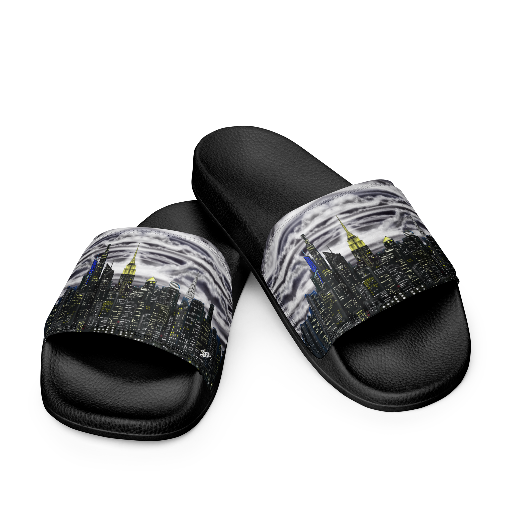 Black slide sandals with cityscape Loria NYC Art design on a white background