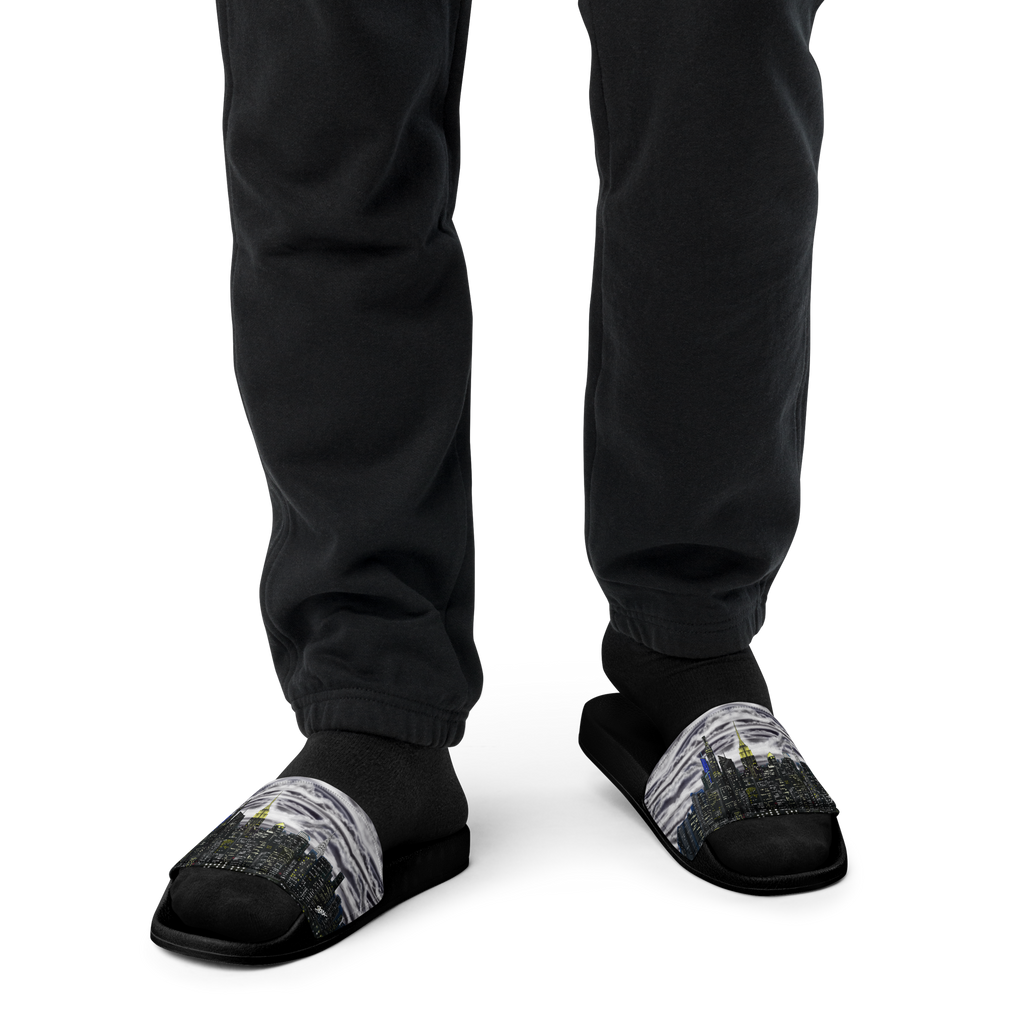 Black slippers with cityscape Loria NYC Art design worn by a person on a white background
