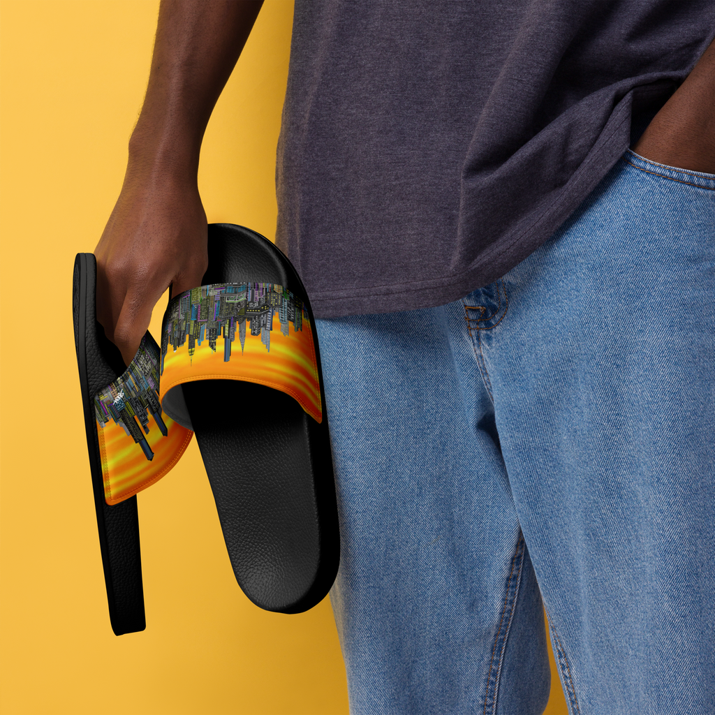 Person holding a sandal with a colorful sole Loria NYC Art design against a yellow background