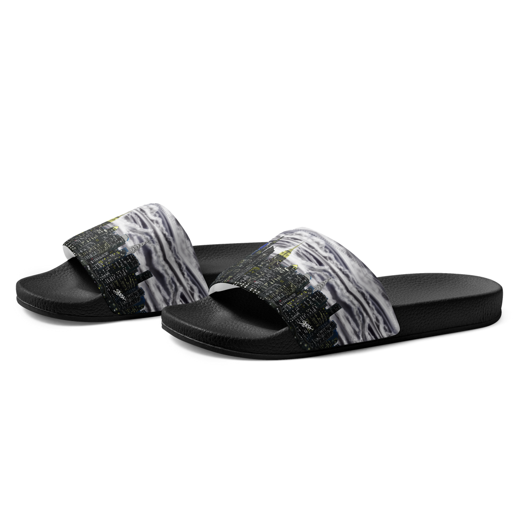 Black slide sandals with Loria NYC Art pattern straps on a white background