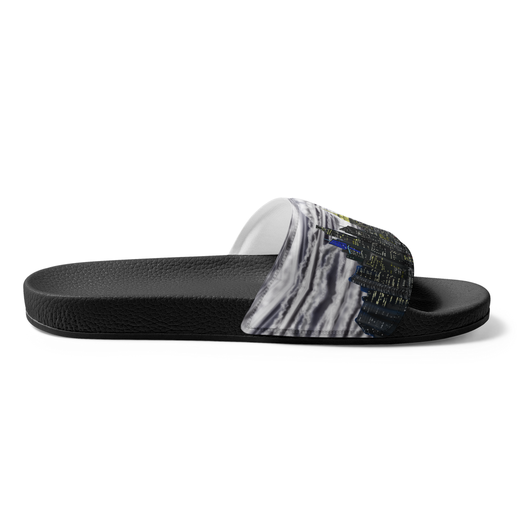 Black Loria NYC Art slide sandal with a patterned strap on a white background