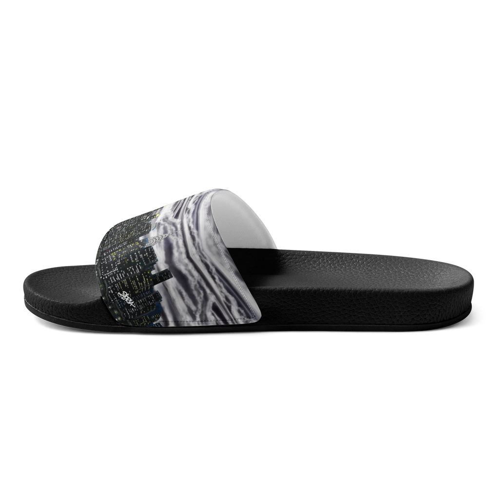 Black slide sandal with a Loria NYC Art strap on a white background