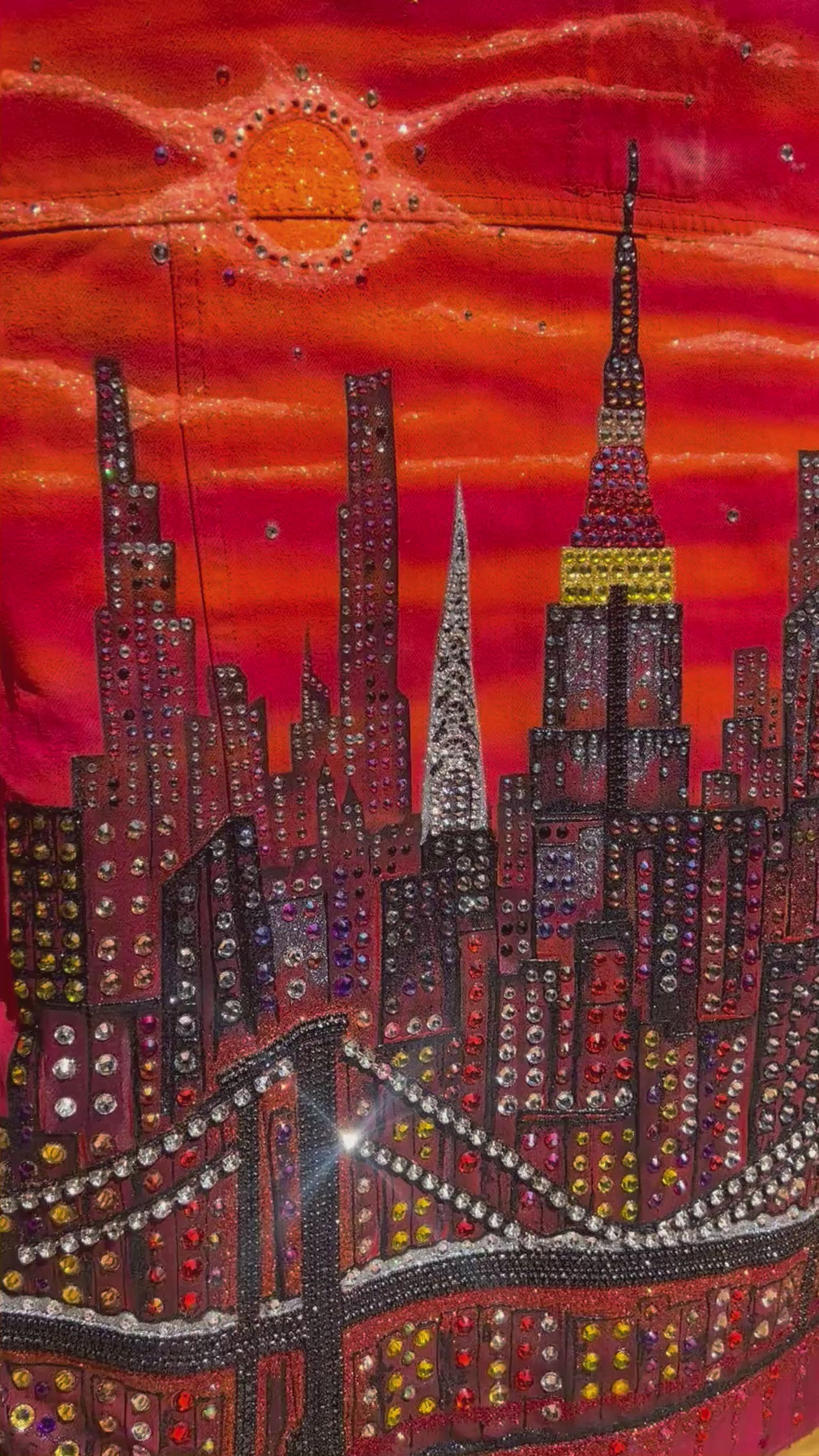 Vertical video format of a jacket with Loria NYC Art