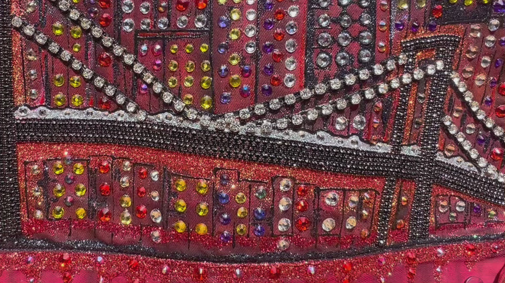 Video of detail Loria NYC Art on the back of a red jacket