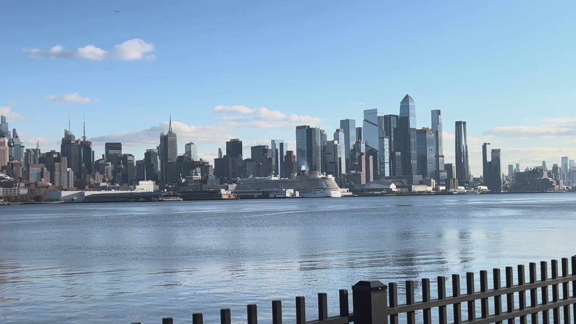 Horizontal video of skyline with jacket covered in Loria NYC Art 