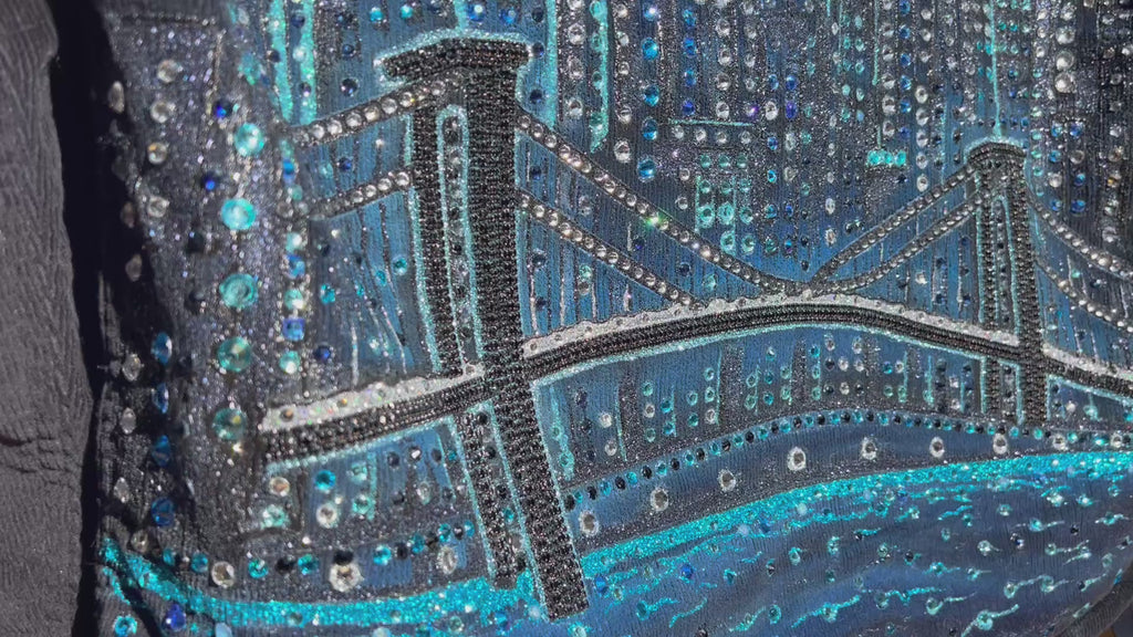 Cityscape Loria NYC Art design on the back of a Blue corduroy jacket in a video