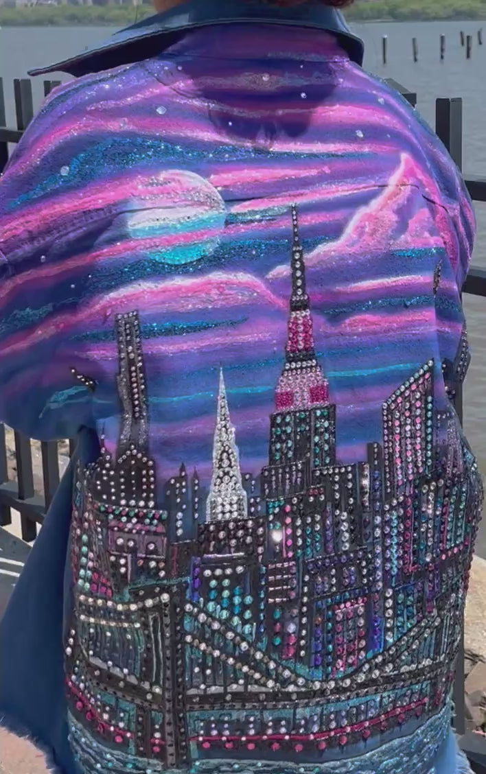 Women stepping in a Loria NYC Art jacket outside.