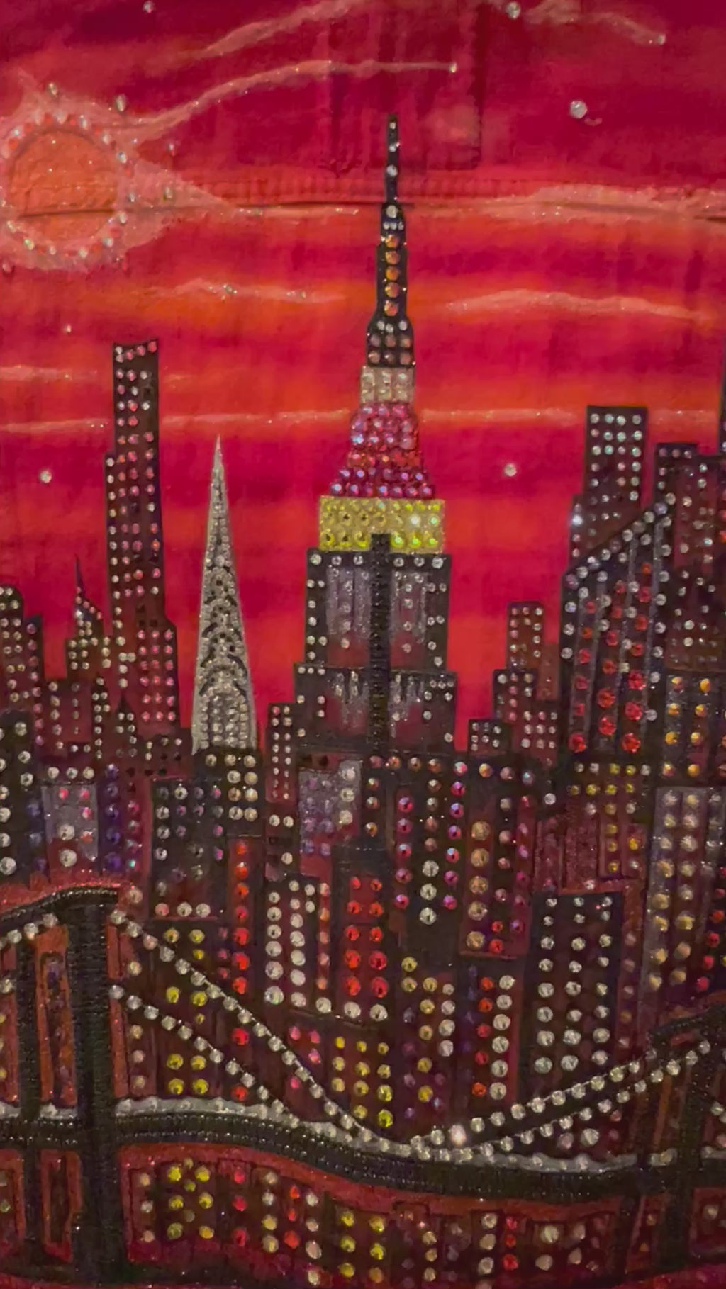 Video details of buildings by Loria NYC Art on a jacket 