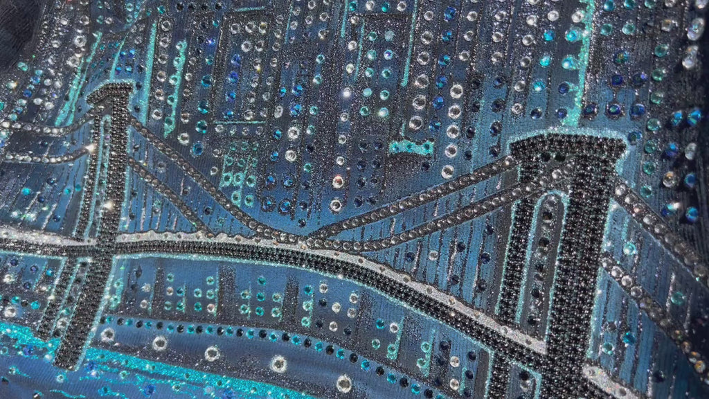 Video of Loria NYC Art on a blue corduroy jacket