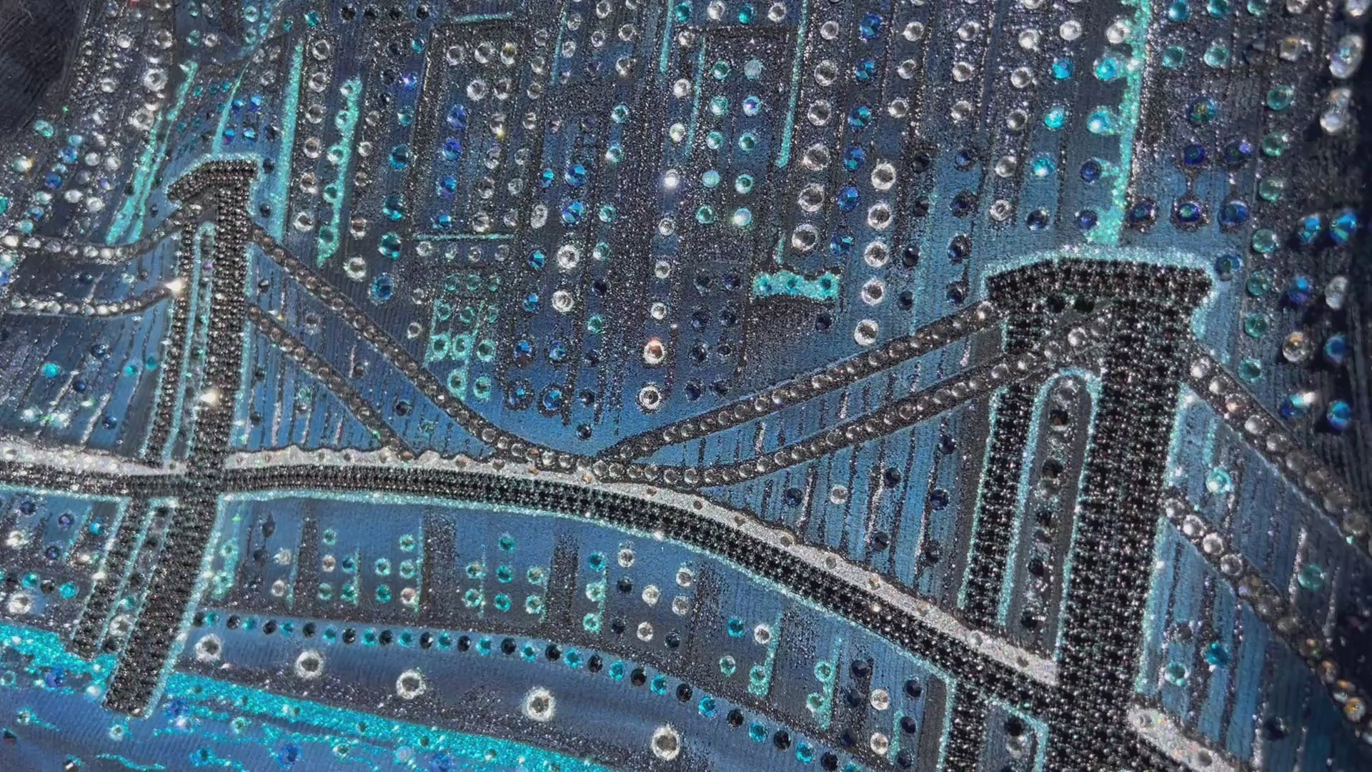 Video of Loria NYC Art on a blue corduroy jacket