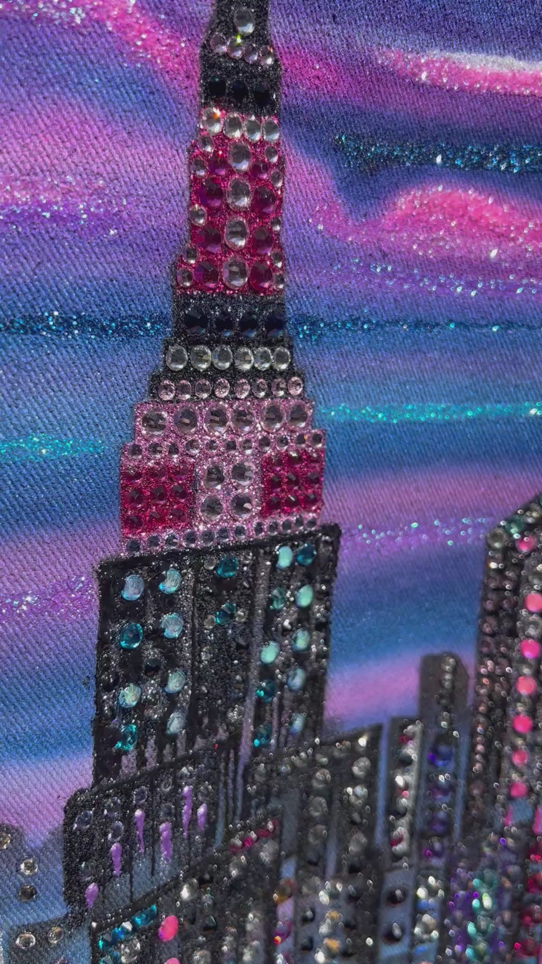 Video of a detailed artwork by Loria NYC Art on a denim jacket