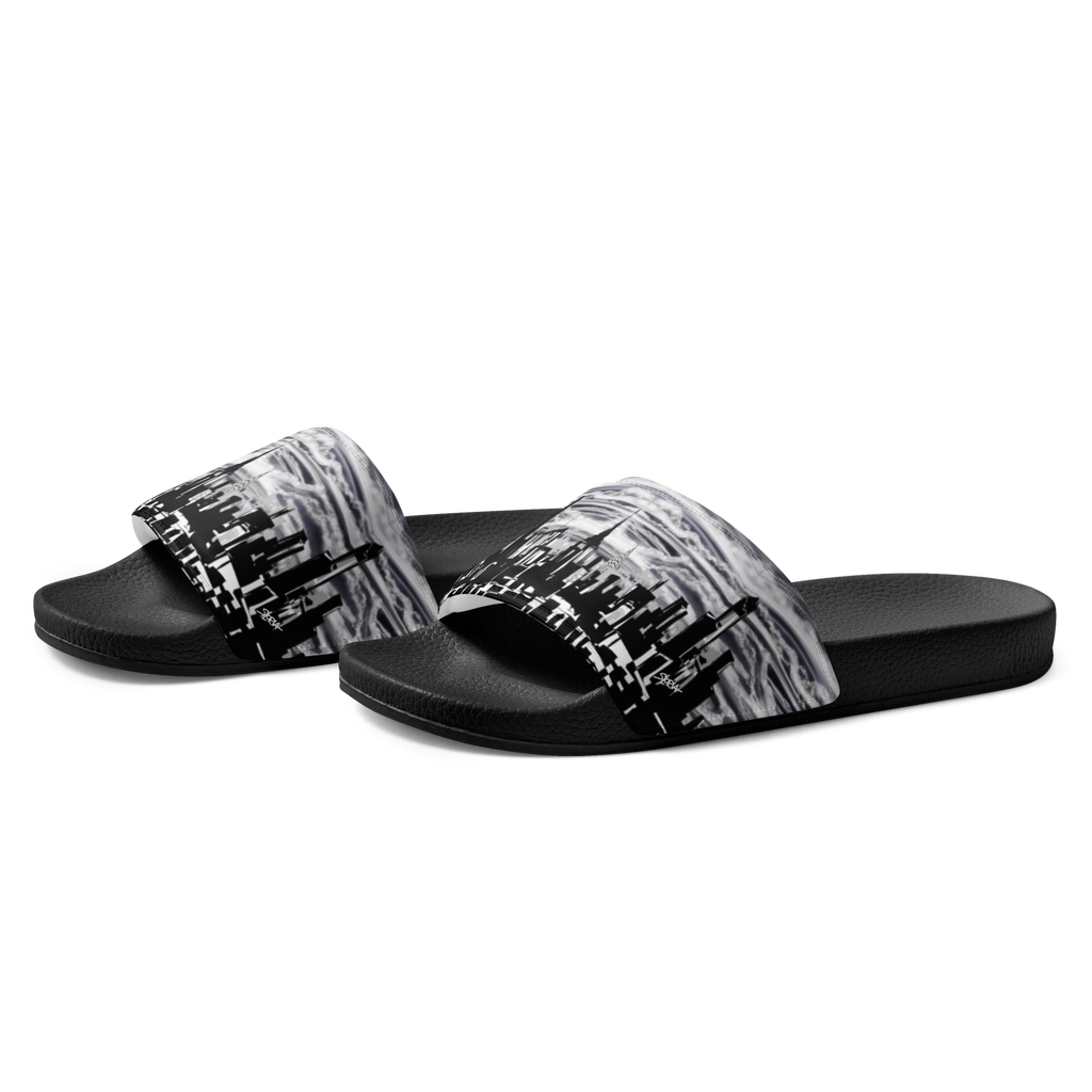 Black and white designed Loria NYC Art sandals on a white background