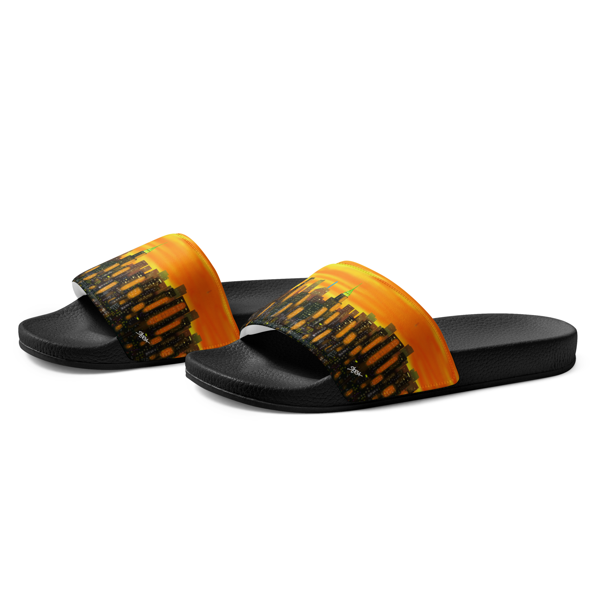Black and orange Loria NYC Art slide sandals on a white background
